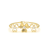 Gold chain bracelet with floral heart design