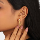 Pear Diamond Cross Studs