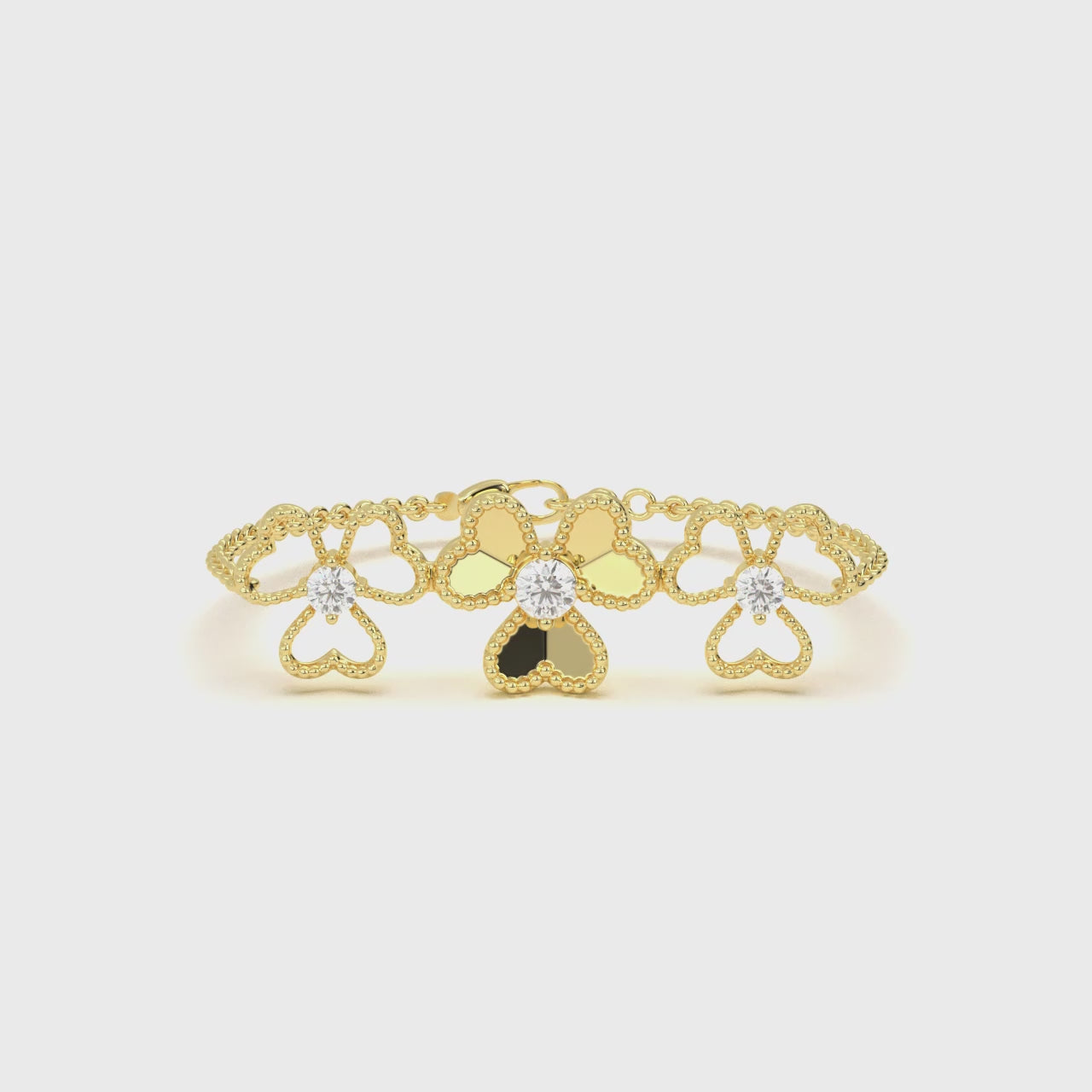 Gold chain bracelet with floral heart design